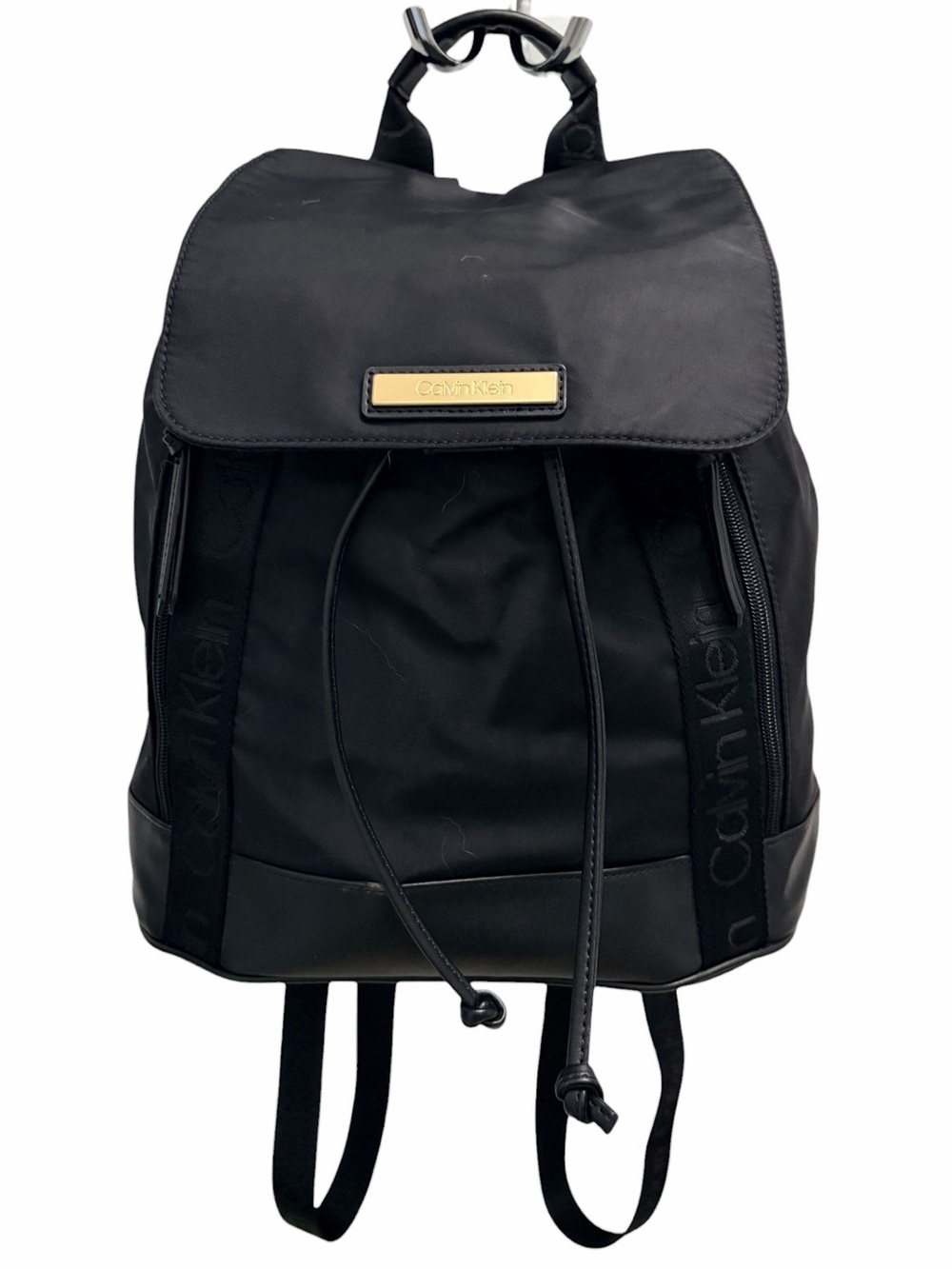 Calvin Klein Black Nylon Drawstring Flap Backpack Gold Logo and pockets